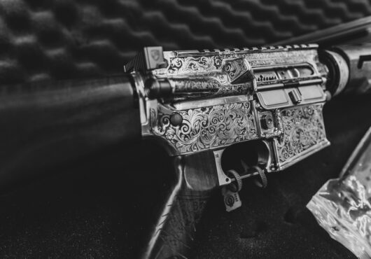 deep engraved firearm