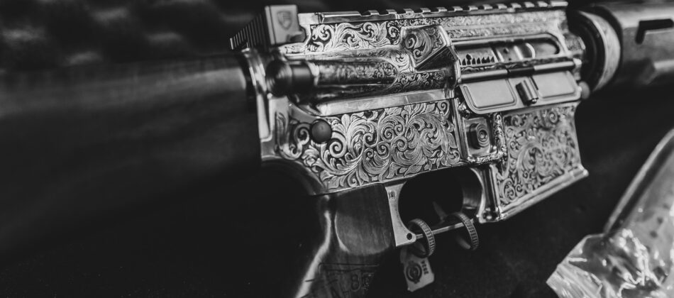 deep engraved firearm